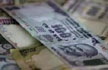 Indian rupee at 9-month low, above 56/USD